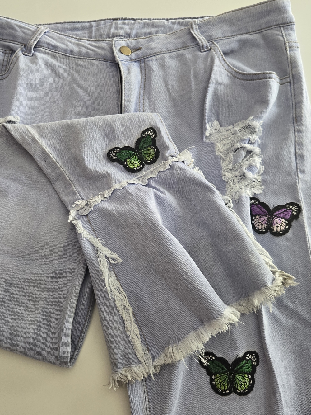 Women’s Light Lavender Distressed Jeans with Butterfly Patches